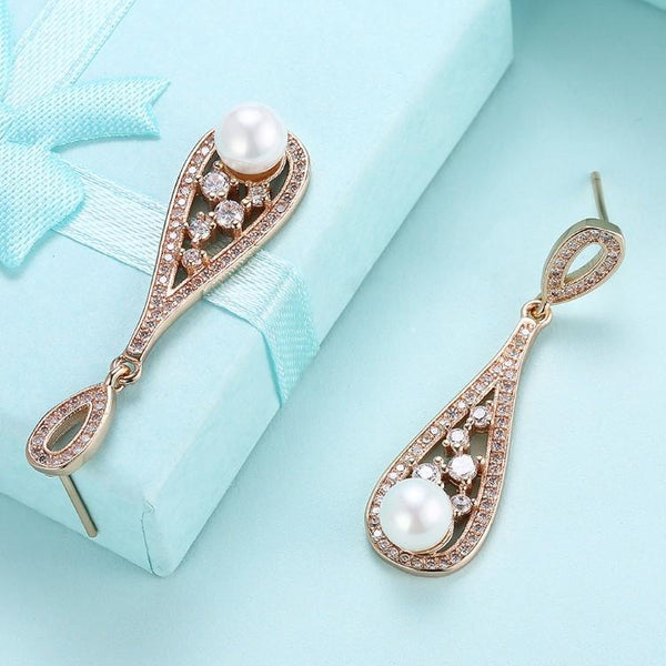 Swarovski Crystal Curved Dangling Pearl Earrings Set in 18K Gold