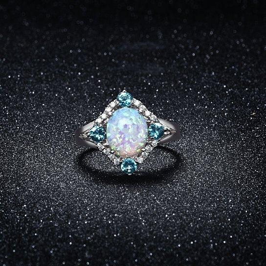 Aquamarine Opal Ring Set in 18K White Gold